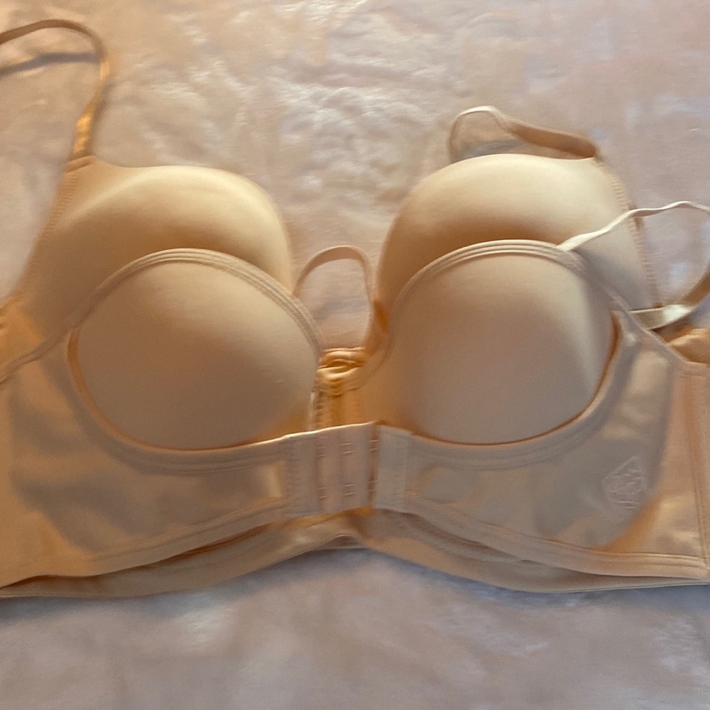 Two bras from Xin I would say they are a 32 -34 A or small B